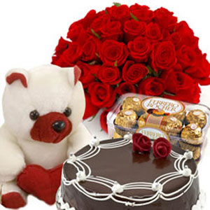 12 Red Roses+Teddy+16 Pieces Ferrero Rocher+1/2 Kg Cake