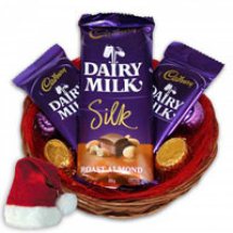 Three Silk Chocolates gift wrapped in a basket