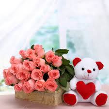 12 pink roses with Teddy bear 6 inches