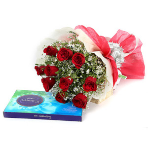 12 red roses with a chococlate celebration box