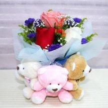 3 Teddies tied together with 3 roses (white Pink Red)in a bouquet