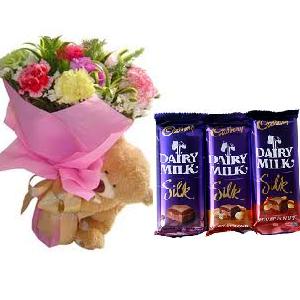 3 Cadburys Silk chocolates with 6 Inches teddy bear and 6 Carnations Bouquet