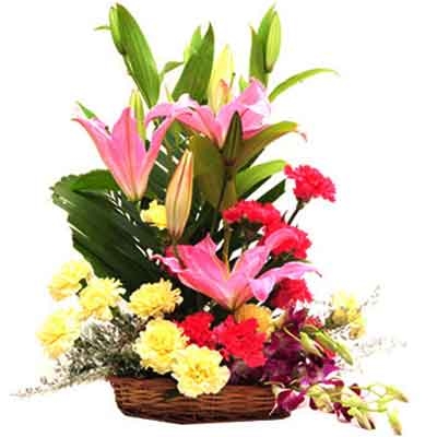 Pink Lilies pink and lemon carnations in a basket
