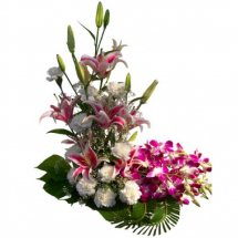 Basket of purple orchids and white carnations