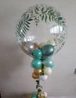 Bubble Balloon blue green golden balloons inside and leaf stuck on the balloon