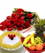 2 Kg. Fresh Fruits in Basket with 1/2 Kg Pineapple Cake and 12 red roses