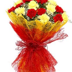 Bouquet wrappred in red with a dozen Red and Yellow carnations