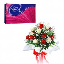 Cadburys celebration with 12 red and white roses bouquet