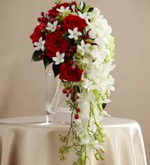 12 Red Roses ad 10 White orchids in vase