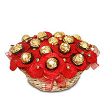 16 ferrero with red wrapping arranged in a basket