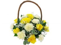 12 yellow white carnations in Basket