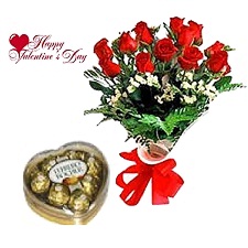A Dozen Red roses in a bouquet with Heart chocolate box
