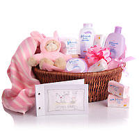 Baby Hamper consisiting of Oil,soap,shampoo,towel,socks, dress,diapers Pink teddy