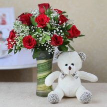 12 Red roses in vase with 6 inches Teddy