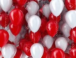 20 gas inflated balloons in red and white tied with ribbons