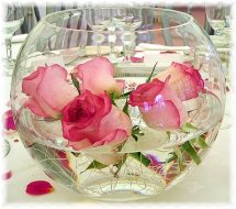 6 Pink Roses inside the glass bowl