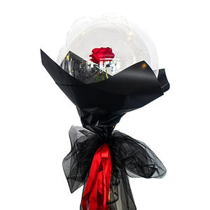 Single red rose Inside a transparent balloons with Fairy lights and black wrapping red ribbons