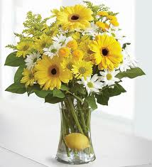 Mixed yellow Flowers in a Vase