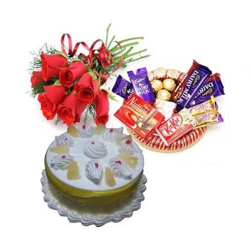 6 Red Roses Small chocolate basket and Half Kg pineapple cake
