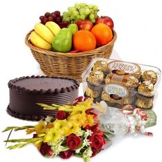 2 Kg. Fresh Fruits with 1/2 Kg Pineapple Cake and 12 Mix flowers 16 Ferrero