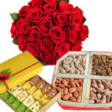 Dozen red roses 1/2 kg dryfruits 1/2 kg mix mithai