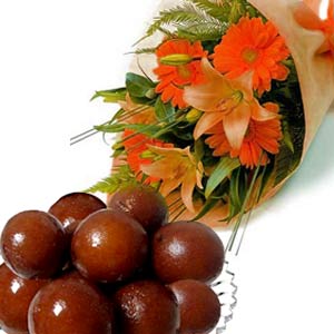 Liliums and Gerberas with 1/2 Kg Gulabjamun