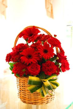 10 Red gerberas Basket