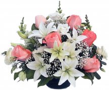 Pink roses white lilies in vase