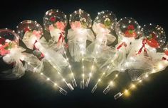 8 Red rose inside 8 transparent Luminous balloon with Red and white Wrapping