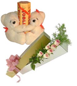 2 teddies with Toblerone chocolates and 6 pink roses