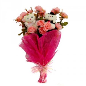 2 Teddies 6 inches each and 12 pink roses in same hand bunch