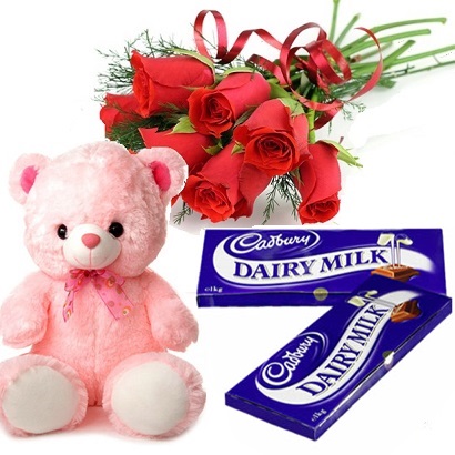 6 red roses with 6 inch Teddy and 2 Dairy Milk chocolates